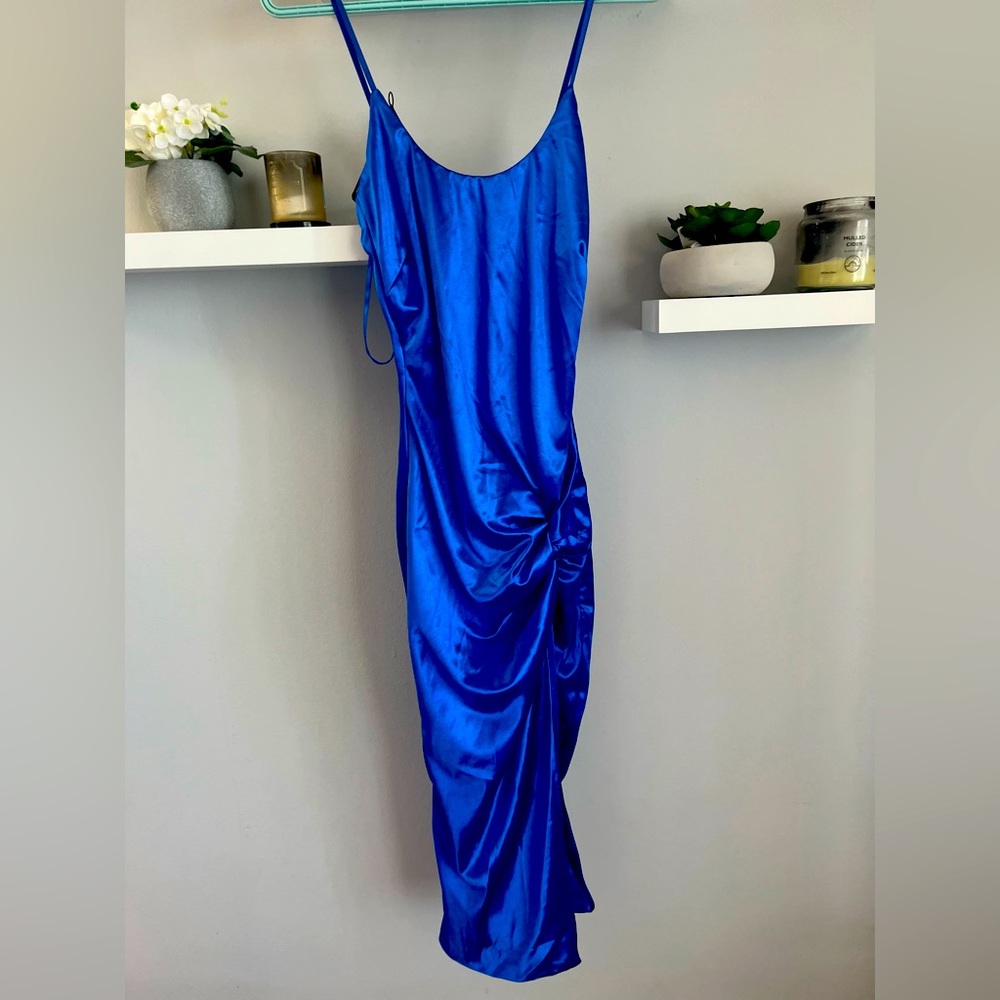 never worn but tried on. tags are off.